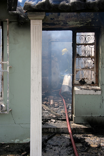 A property with extensive fire and smoke damage